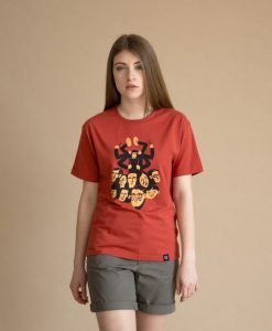 monkey drumming on peoples heads shirt